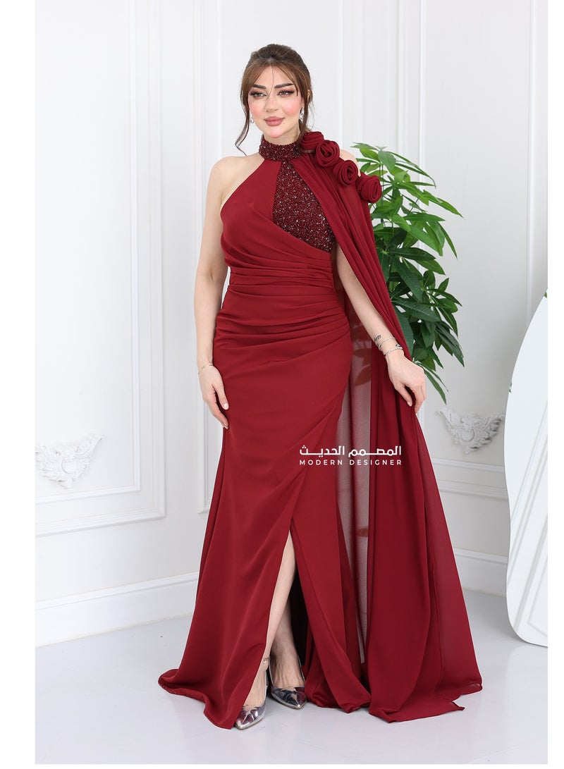 Modern Design An elegant and modern dress crafted from the finest soft and light crepe fabric, designed with elegant and sophisticated embroidery on the chest and neck, with a high embroidered collar that adds charming luxury. The special touch begins with the luxurious floor-length chiffon that gives you a royal presence, and with the prominent embroidered rose on the shoulder, you will appear in the most beautiful look for every occasion. And let's not forget the tastefully designed slit at the bottom of the dress, which adds soft femininity and imaginary appeal to every step you take. A modern design that caters to the taste of the modern Saudi woman who loves distinction in every detail. Want to appear with an eye-catching look that suits all occasions? This dress will be your first choice. - Image 1