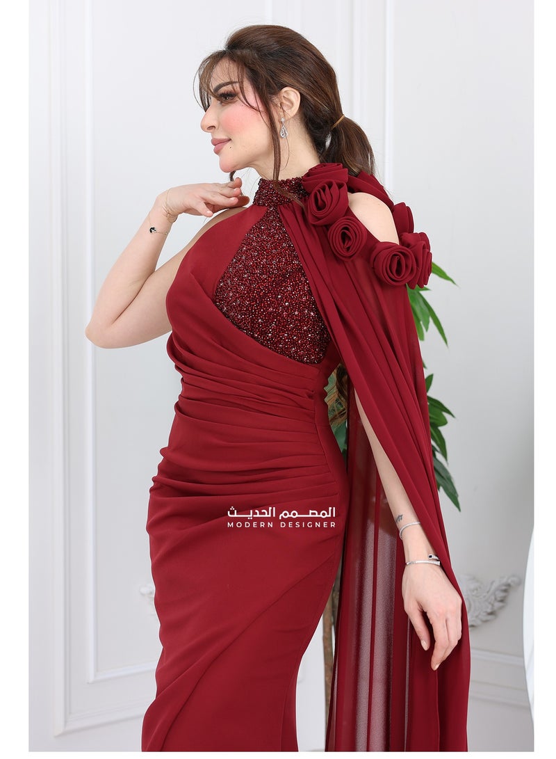 Modern Design An elegant and modern dress crafted from the finest soft and light crepe fabric, designed with elegant and sophisticated embroidery on the chest and neck, with a high embroidered collar that adds charming luxury. The special touch begins with the luxurious floor-length chiffon that gives you a royal presence, and with the prominent embroidered rose on the shoulder, you will appear in the most beautiful look for every occasion. And let's not forget the tastefully designed slit at the bottom of the dress, which adds soft femininity and imaginary appeal to every step you take. A modern design that caters to the taste of the modern Saudi woman who loves distinction in every detail. Want to appear with an eye-catching look that suits all occasions? This dress will be your first choice. - Image 3