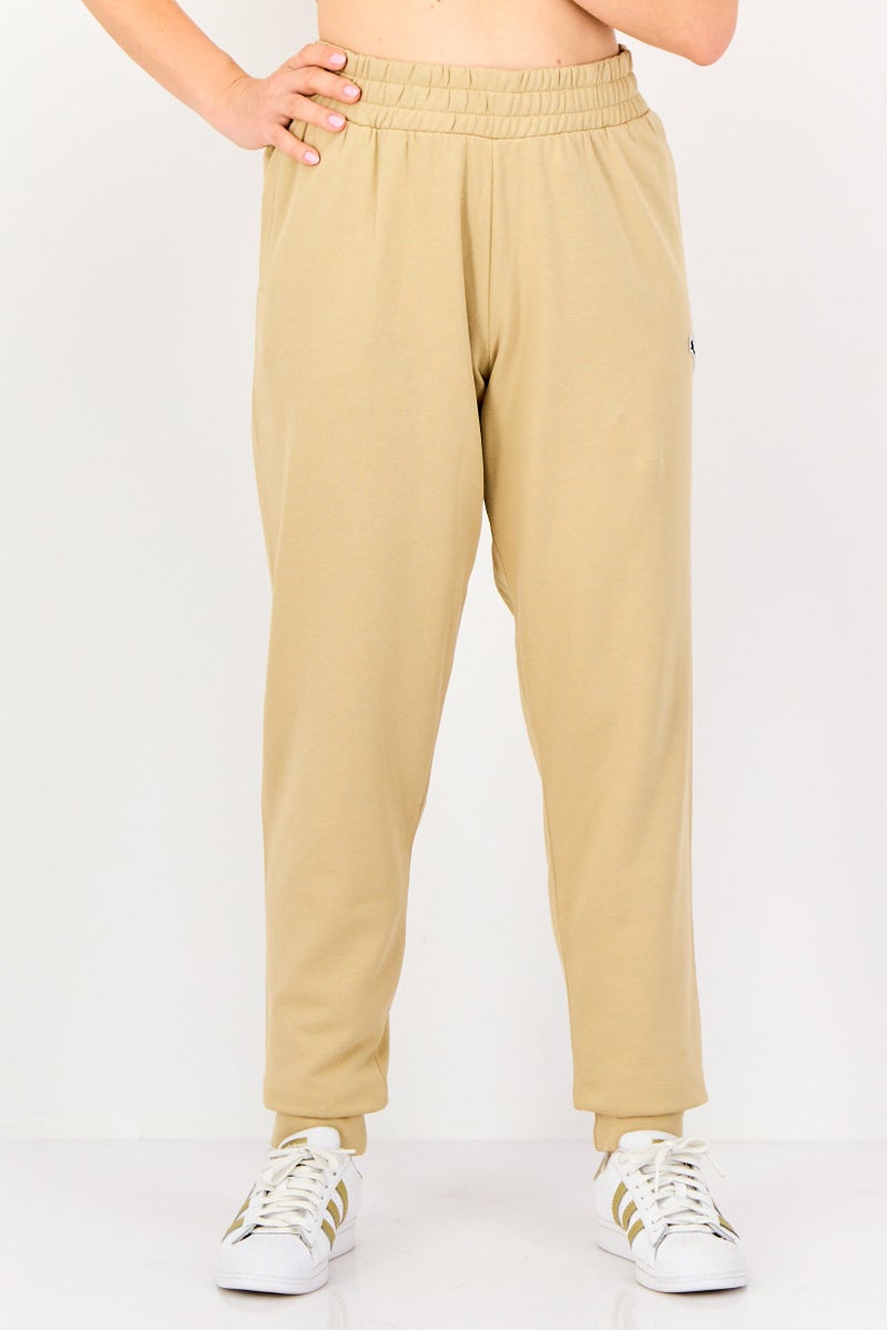 PUMA Women Sportswear Fit Outdoor Sweatpants, Beige - Image 1