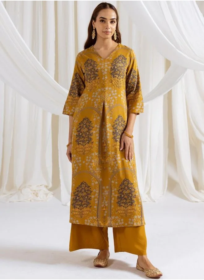 ISHIN Palazzo Women Mustard Rayon Kurta Set with Embroidered pattern Tunic and Palazzo features a Round neckline and Three-Fourth Sleeve secured with Elastic closure and styled in Straight Fit ideal for Festive moments — a must-have for your statement wardrobe.