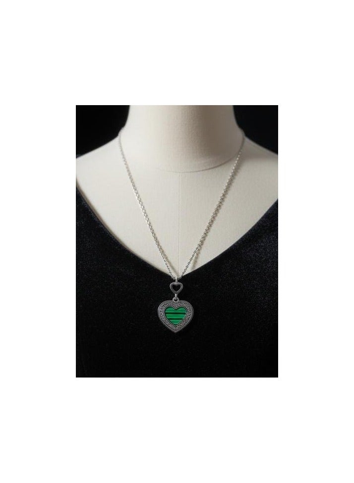 Luxuria A necklace featuring a heart-shaped pendant with a green malachite-like stone and a Greek key pattern. - Image 4