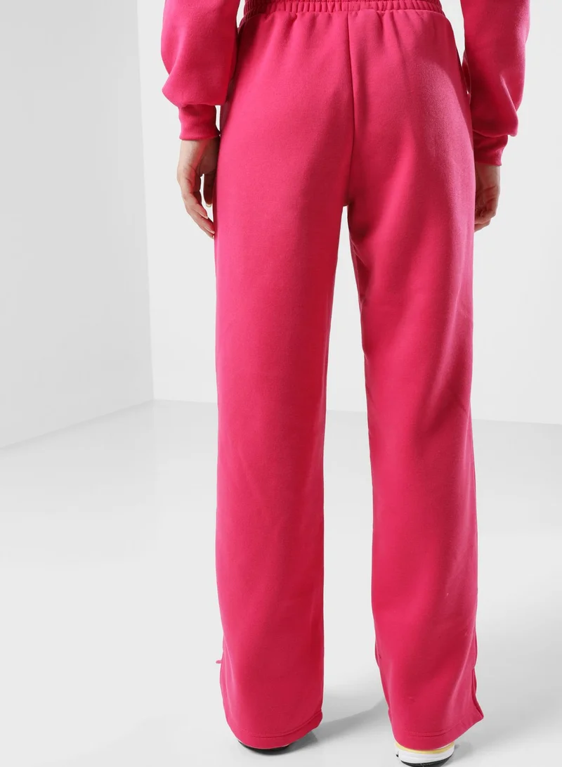 The Giving Movement Wide Leg Logo Joggers