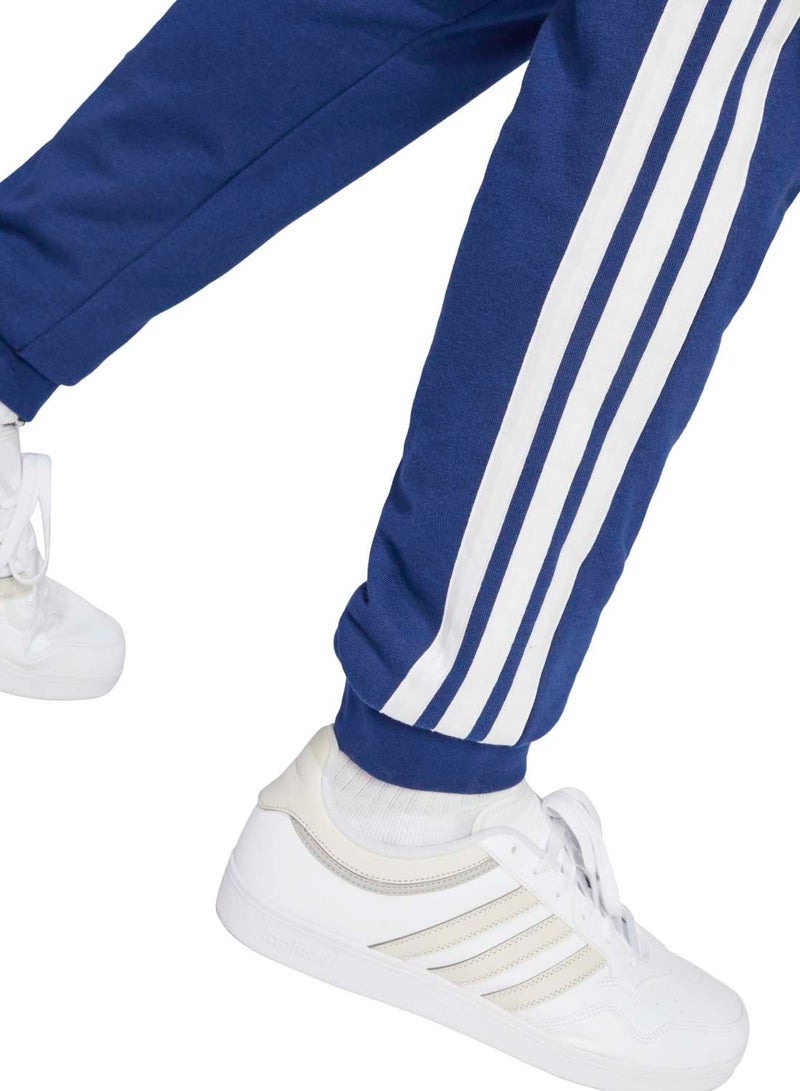 Adidas Essentials Three Stripes French Terry Pants - Image 5
