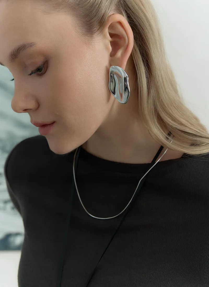 ليتشي أقراط من المعدن الملتوي