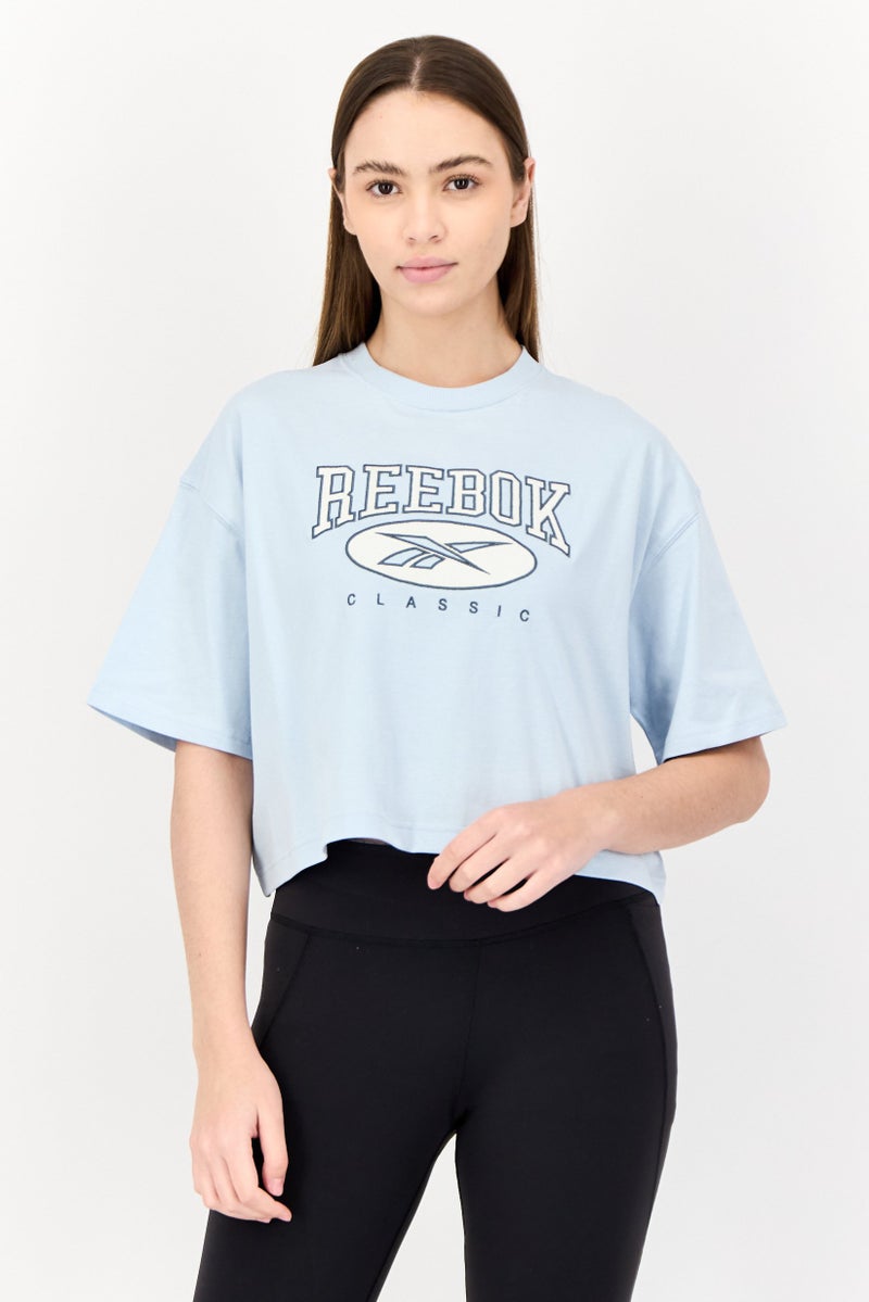 Reebok Women Sportswear Fit Short Sleeve Outdoor Top, Light Blue - Image 1