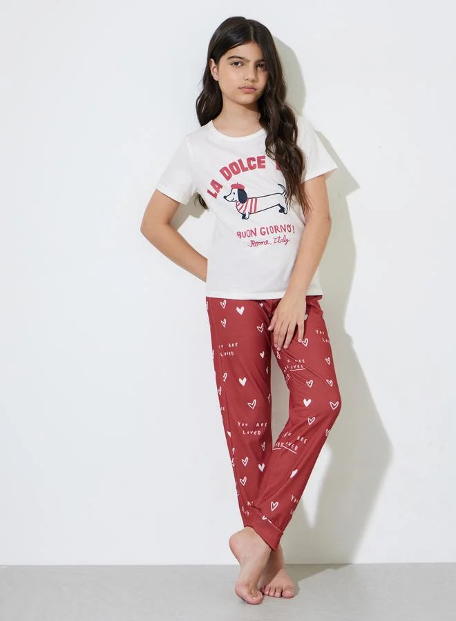 Styli Teen Girls White Graphic Print T-Shirt and Red Cuffed Pants Pyjama Set
