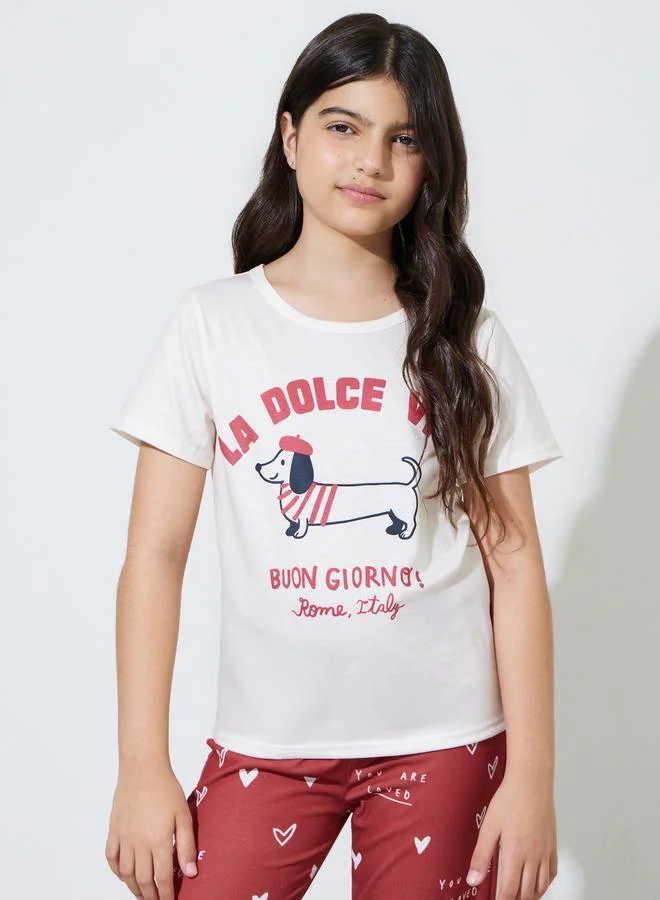 Styli Teen Girls White Graphic Print T-Shirt and Red Cuffed Pants Pyjama Set