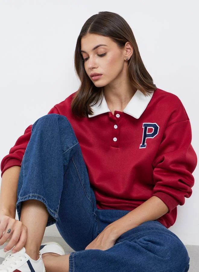 Styli Styli Red Varsity Letter Sweatshirt with Contrast Collar