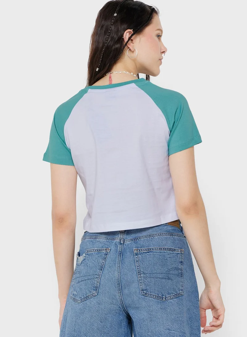 Ginger Raglan Cropped Fit Graphic T-Shirt