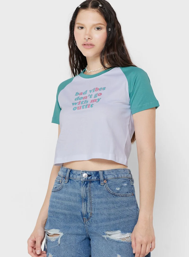 Ginger Raglan Cropped Fit Graphic T-Shirt
