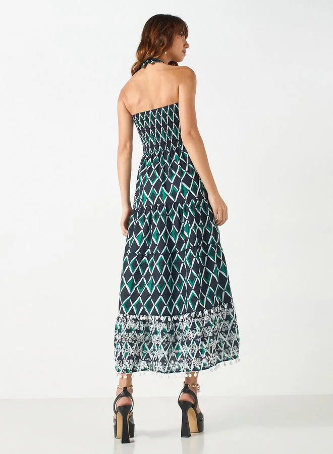 تواكستريمز فستان هالتر بتفاصيل كشكش وطبعات أزهار من تو إكستريمز