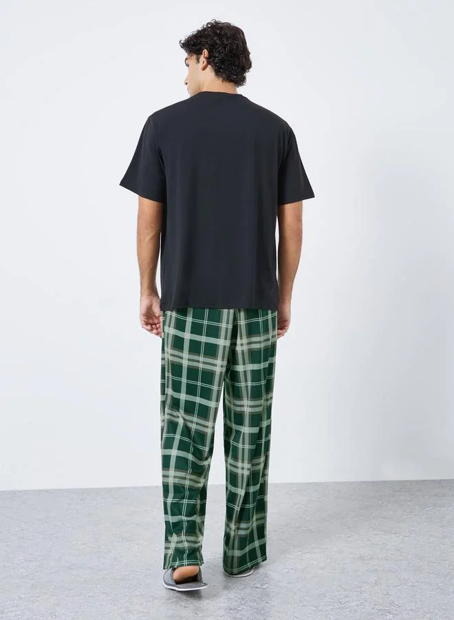 Styli Black Men Relaxed Fit Solid T-Shirt and Checked Pyjama Set for Men | Best Price UAE