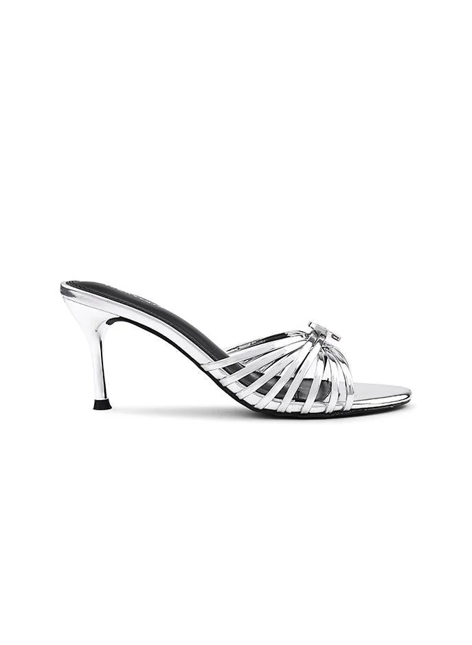 أيقون Slipper decorated with sparkling rhinestone accents.