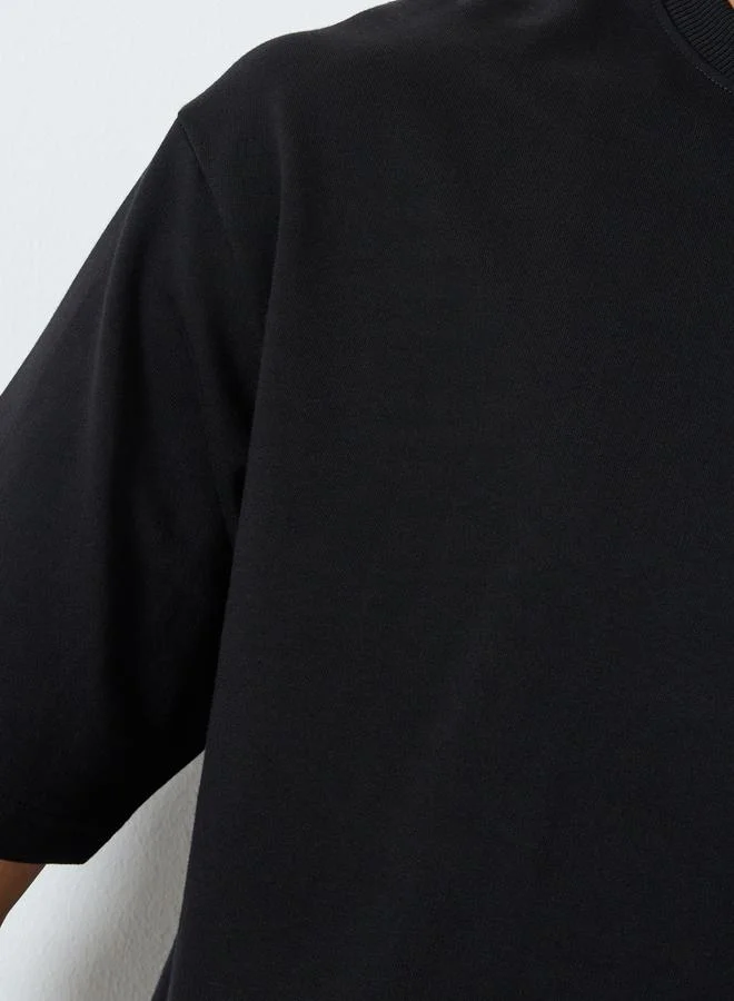 Styli Styli Men Graphic Print Interlock Oversized T-Shirt