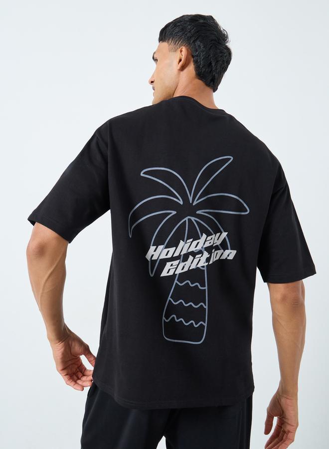 Styli Men Graphic Print Interlock Oversized T-Shirt - Image 1