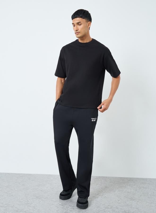 Styli Men Graphic Print Interlock Oversized T-Shirt - Image 2