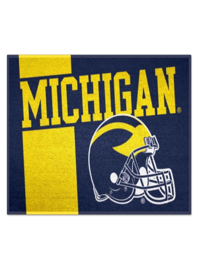 FANMATS 18759 Michigan Wolverines Starter Mat Accent Rug - 19in. x 30in. | Sports Fan Home Decor Rug and Tailgating Mat Uniform Design - Image 1