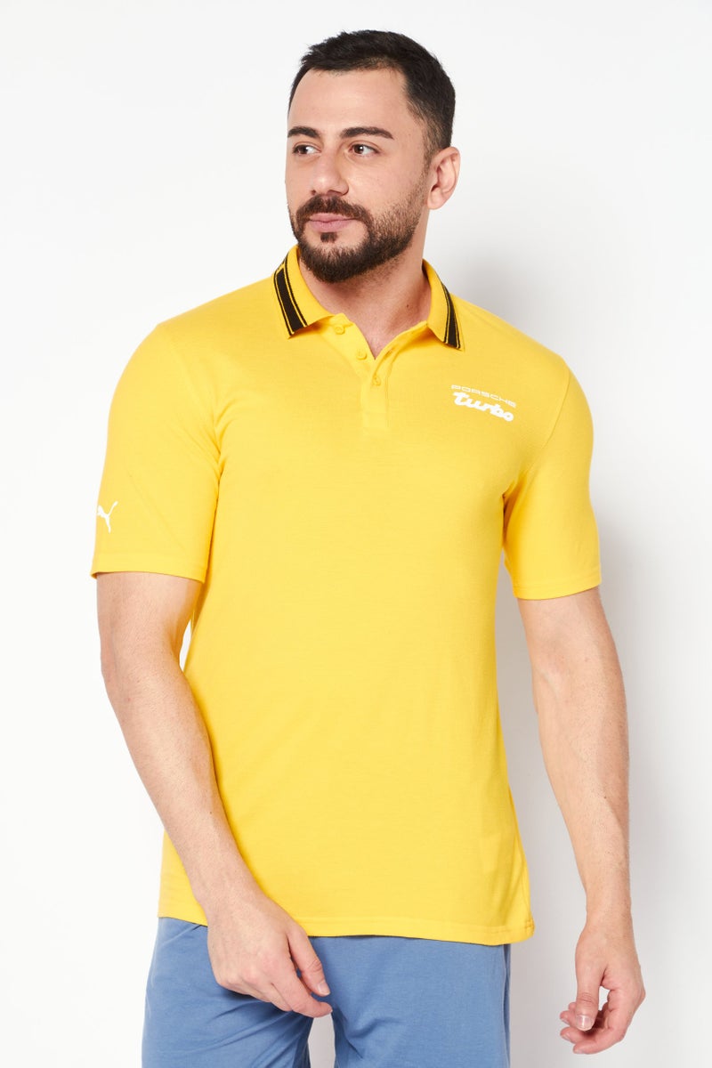 PUMA Puma x Porsche Design Men Sportswear Fit Short Sleeve Outdoor Polo Shirt, Yellow - Image 1