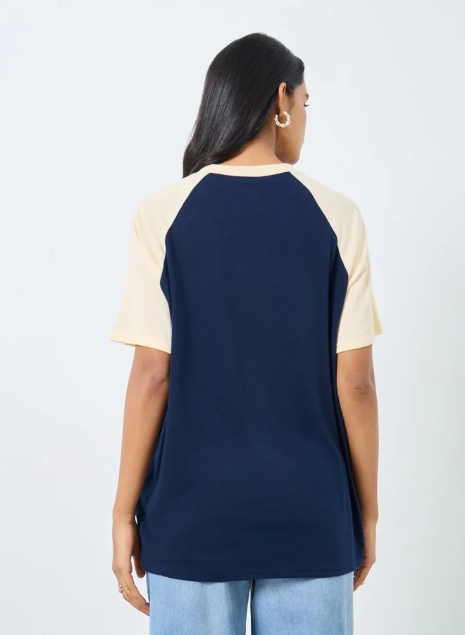 تايك تو تيشيرت فضفاض بأكمام رجلان