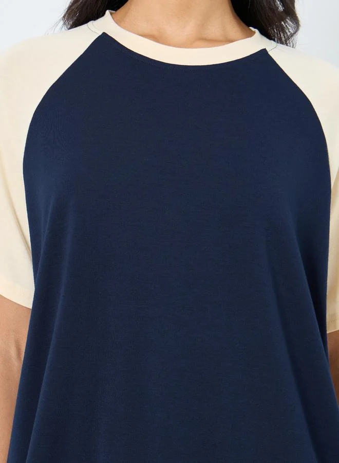 تايك تو تيشيرت فضفاض بأكمام رجلان