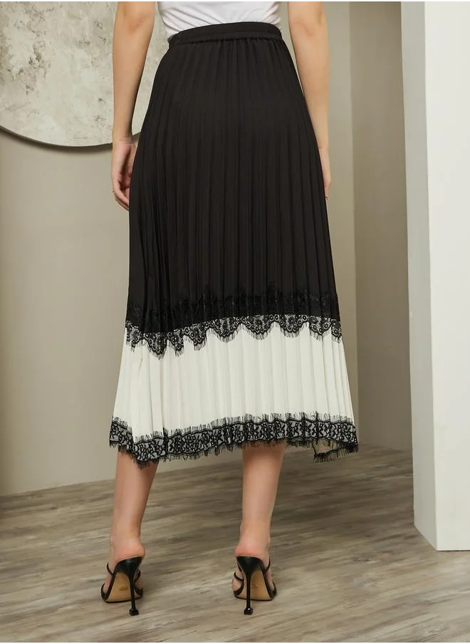 ستايلي Color Block Pleated A-Line Midi Skirt with Lace Trim