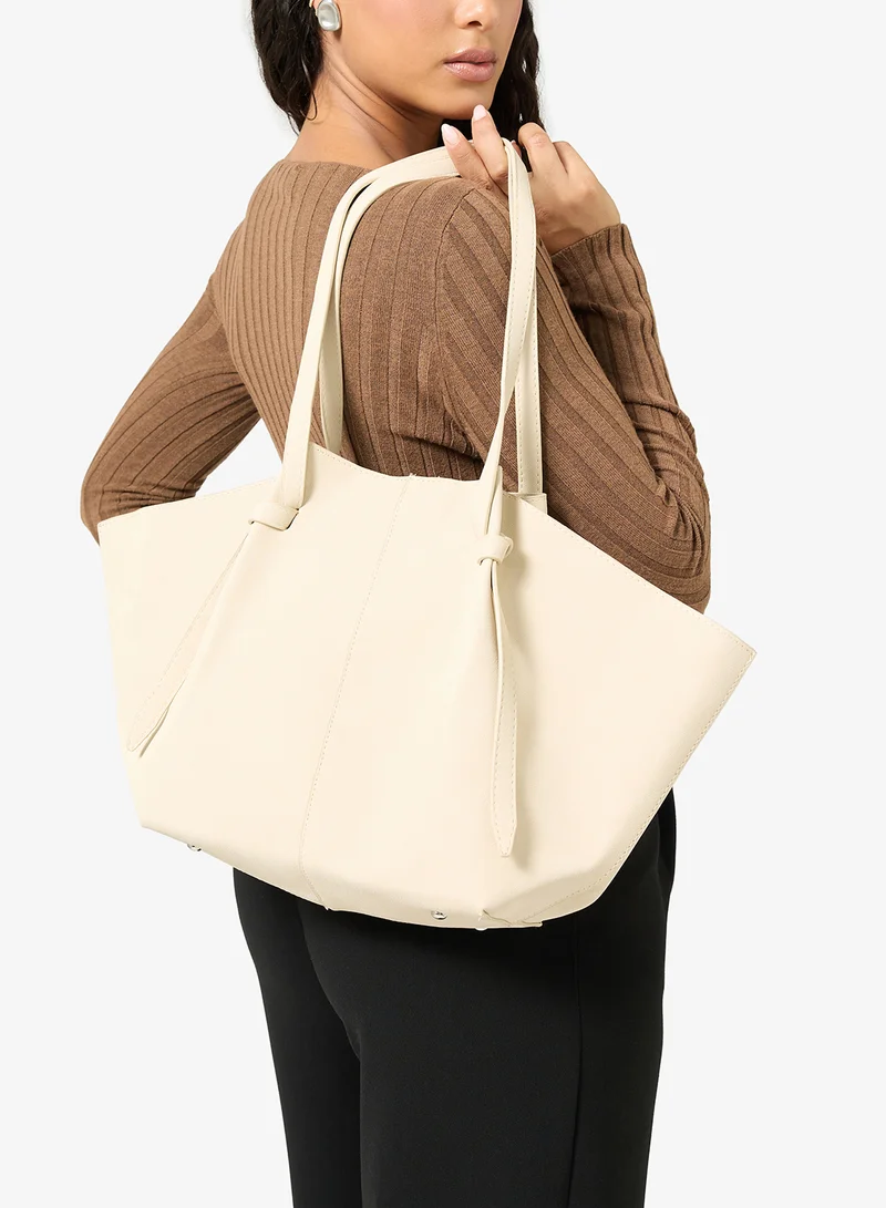 ايلا حقيبة توت من جلد السويد