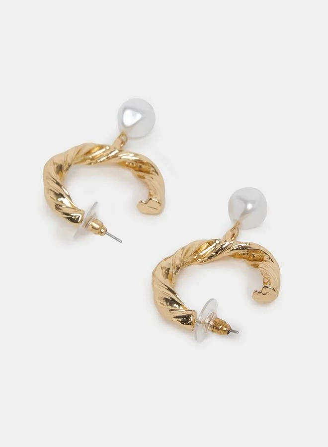 ستايلي Twisted Design Hoop Earrings