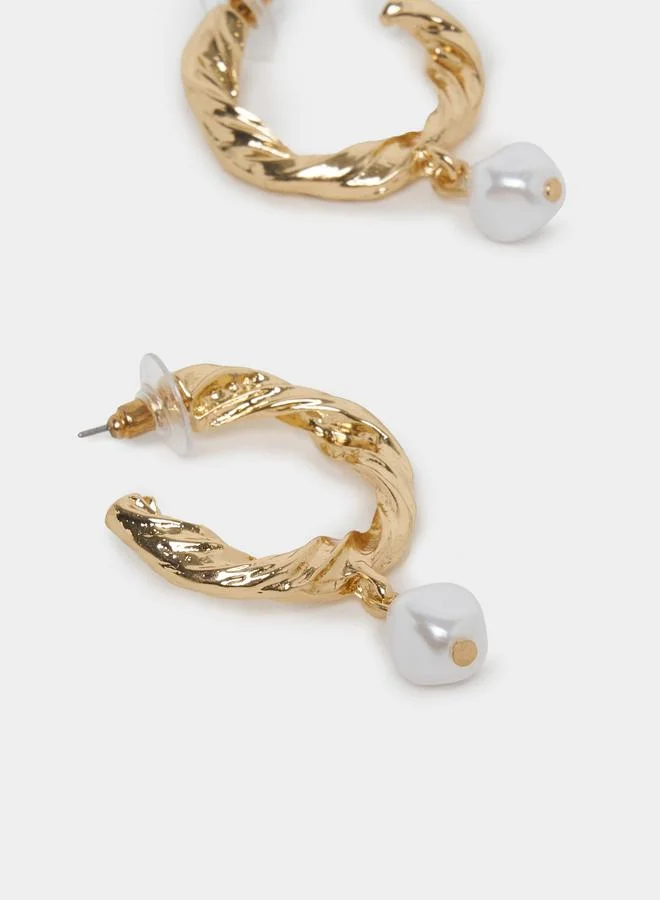 ستايلي Twisted Design Hoop Earrings