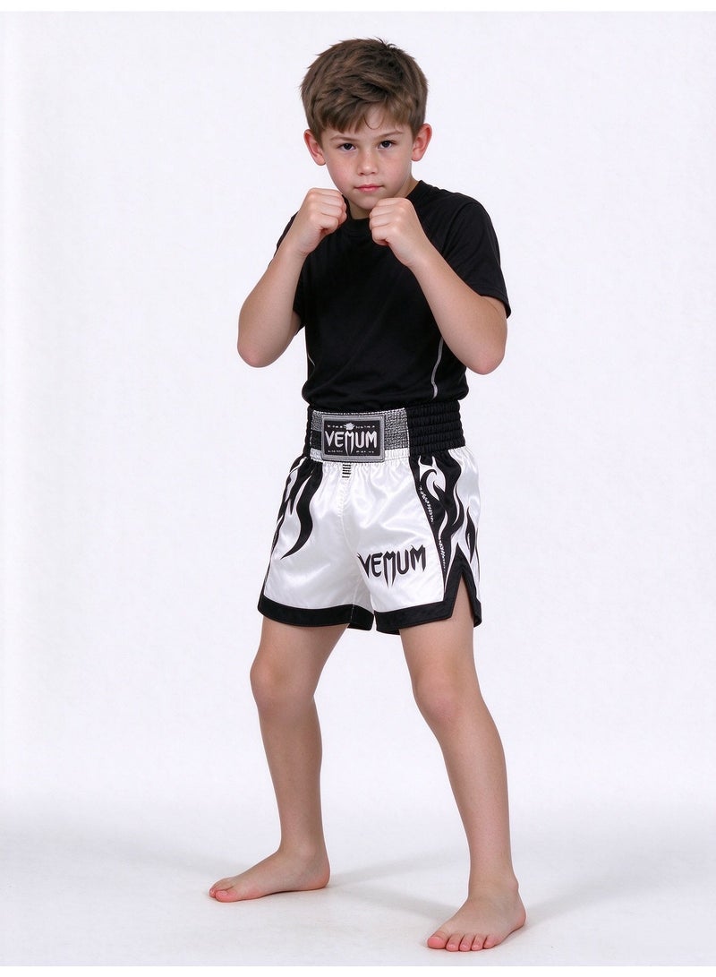 فينوم Venum Kids' Elite Boxing Shorts (Age 10) | أسلوب المنافسة الأسود / الأبيض  حماية الفخذ التنفسية عالية التمدد متوافقة  حجم الخياطة المعززة: 130 - Image 4