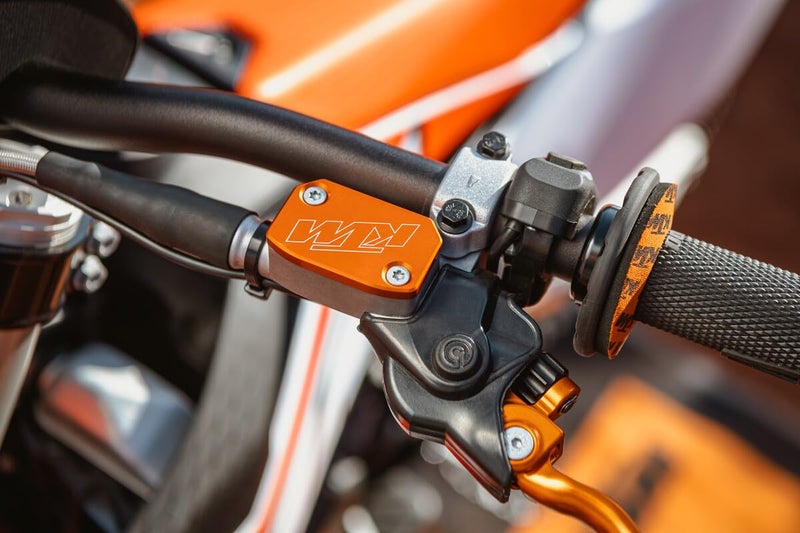 KTM KTM GENUINE ORANGE mastercylinder covers that will fit onto the BREMBO front brake or clutch mastercylinder on your motorcycle. SXS05450210  - Image 2