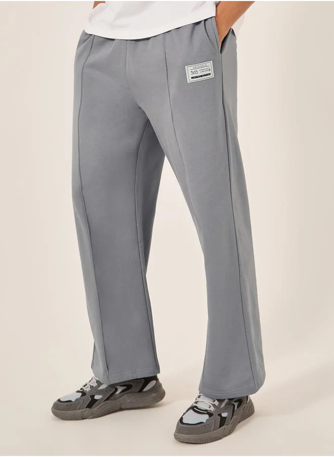 Styli Fleece Pintuck Wide Leg Joggers with Badge Detail