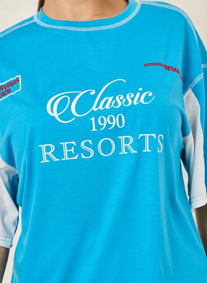 Styli Oversized Classic Resorts Slogan T-Shirt with Embroidery Detail