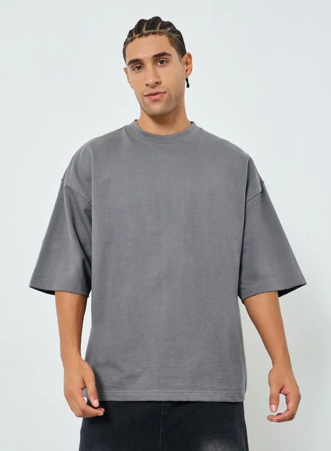 Styli Men Grey Boxy Fit Embossed Print T-Shirt