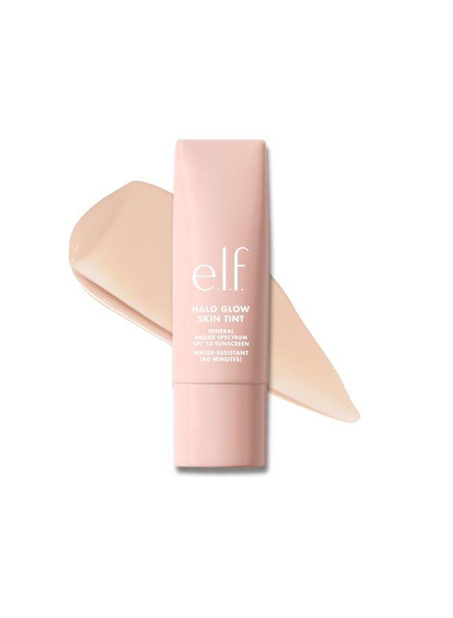 إلف e.l.f. Halo Glow Skin Tint SPF 50، مرطب ملون لتغطية خفيفة وقابلة للبناء، يمنح البشرة إشراقة طبيعية، نباتي ولم يُجرب على الحيوانات، درجة 3 Fair Cool (فاتح مائل للبرودة)، سعة 30 مل. - Image 1