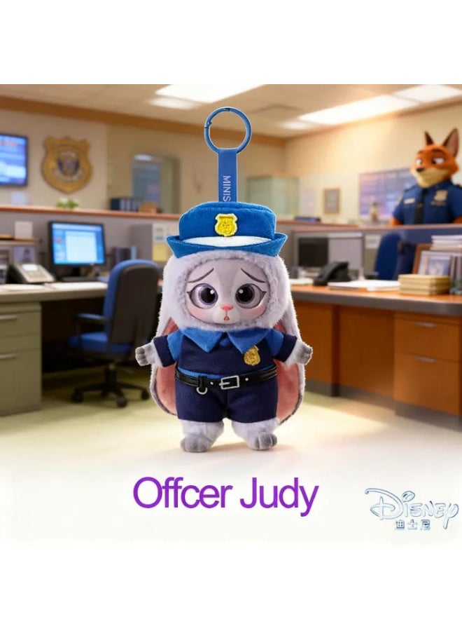 🔹 Disney Officer Judy Fabric Medal – MINISO Edition A cute little doll of Judy the bunny from Zootopia, dressed in her police uniform. Made of soft fabric and featuring a loop for attaching to children's bags or keys.  👮‍♀️ Perfect for Disney fans and lovers of the heroic character Judy! - Image 1