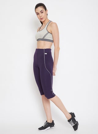 Clovia Snug Fit Mid Rise Active Capri in Dark Purple