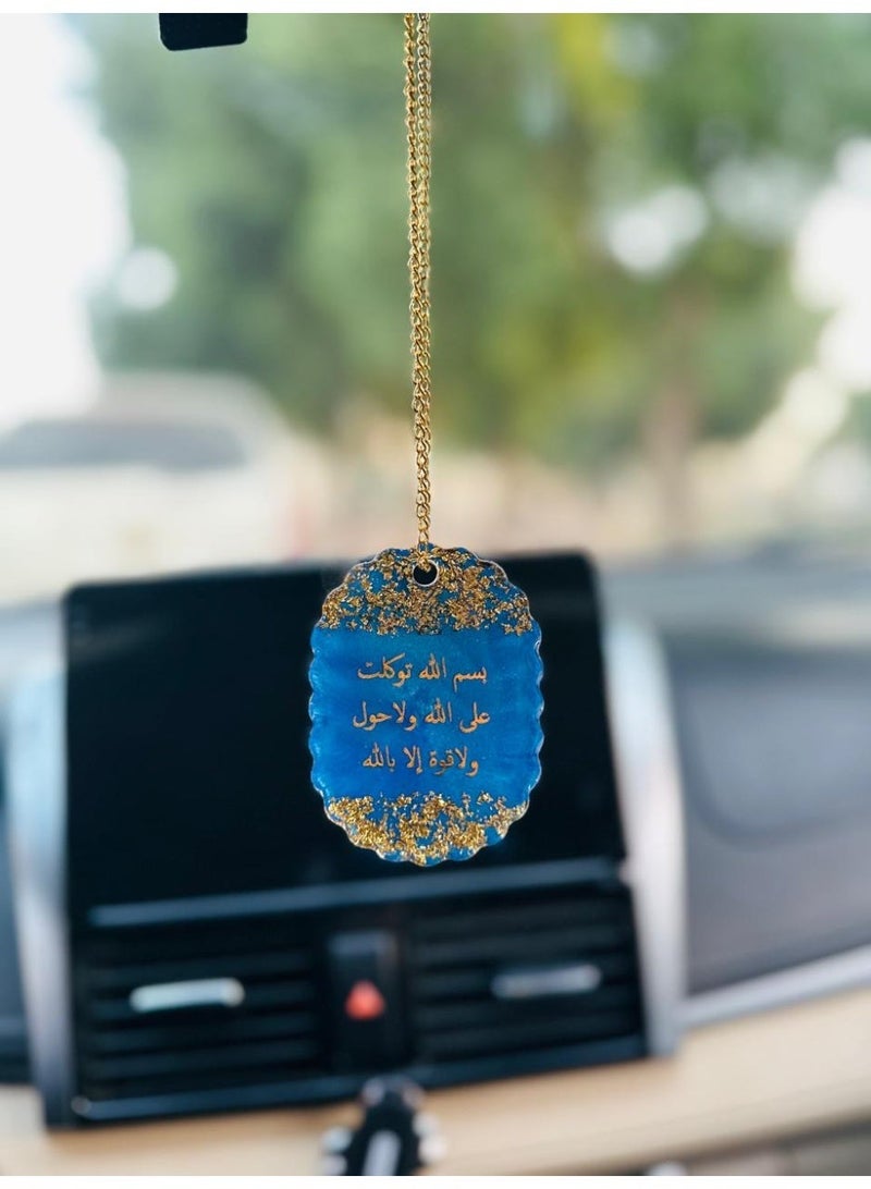 A car ornament decorated with gold leaf and an Islamic phrase on one side; a car decoration accessory. - Image 3