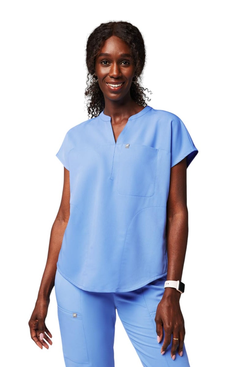 Fabletics Women's Evolve 3-Pocket Scrub Top with an Oversized Fit - MotionTech, 4-Way Stretch, Wrinkle-Resist, Anti-Shrink, M, Ceil Blue - Image 1