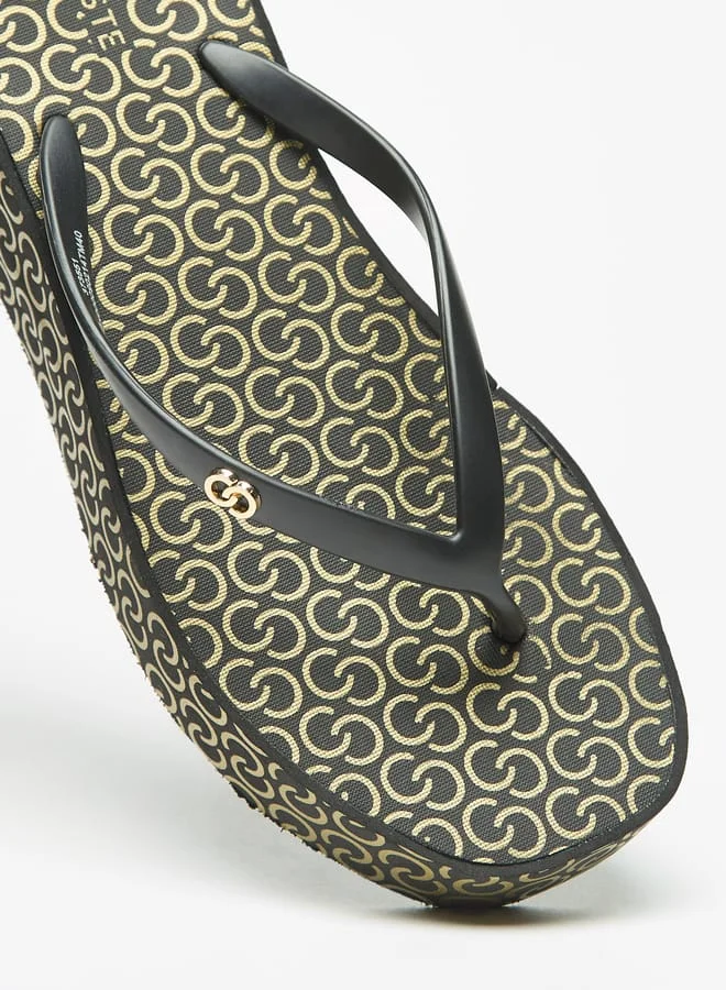 سيليست Women's Monogram Print Flatform Thong Slippers
