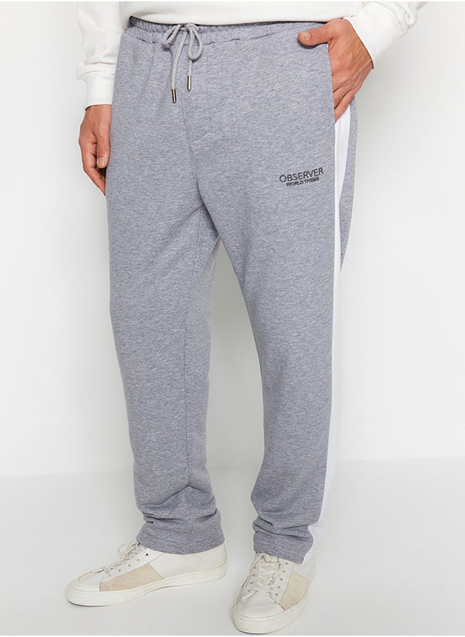 trendyol Men's Gray Men's Regular/Regular Cut Contrast Color Paneled Bold Text with Embroidered Regular Leg Sweatpants.  - Image 1