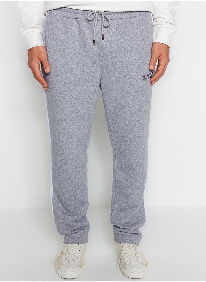 trendyol Men's Gray Men's Regular/Regular Cut Contrast Color Paneled Bold Text with Embroidered Regular Leg Sweatpants.  - Image 4