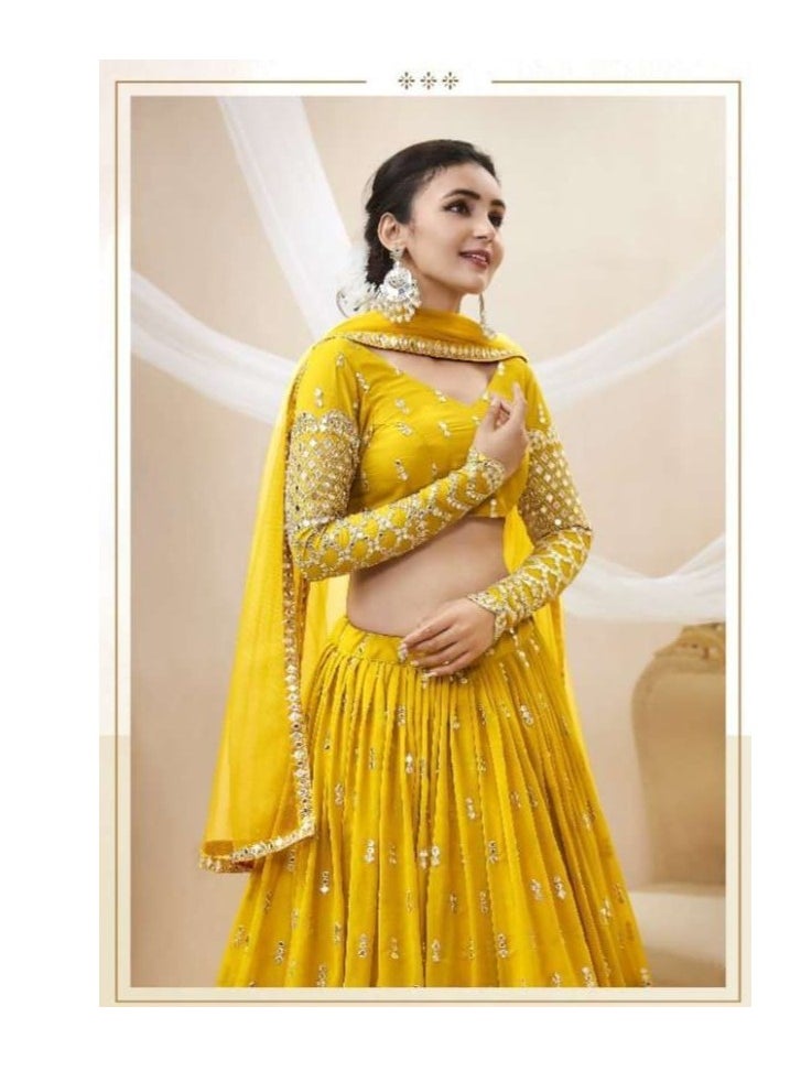 Grab Mantra - White lehenga with embroidered blouse and net dupatta - Image 1