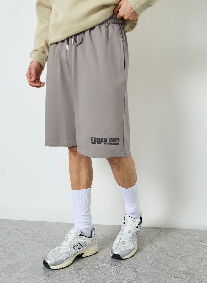 Styli Men Charcoal Placement Print Oversized Shorts