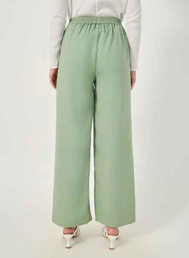 Styli High Rise Tapered Pants with Drawstring Waistband Detail