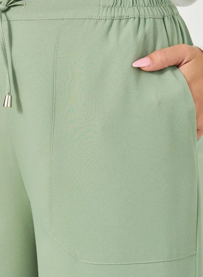 Styli High Rise Tapered Pants with Drawstring Waistband Detail