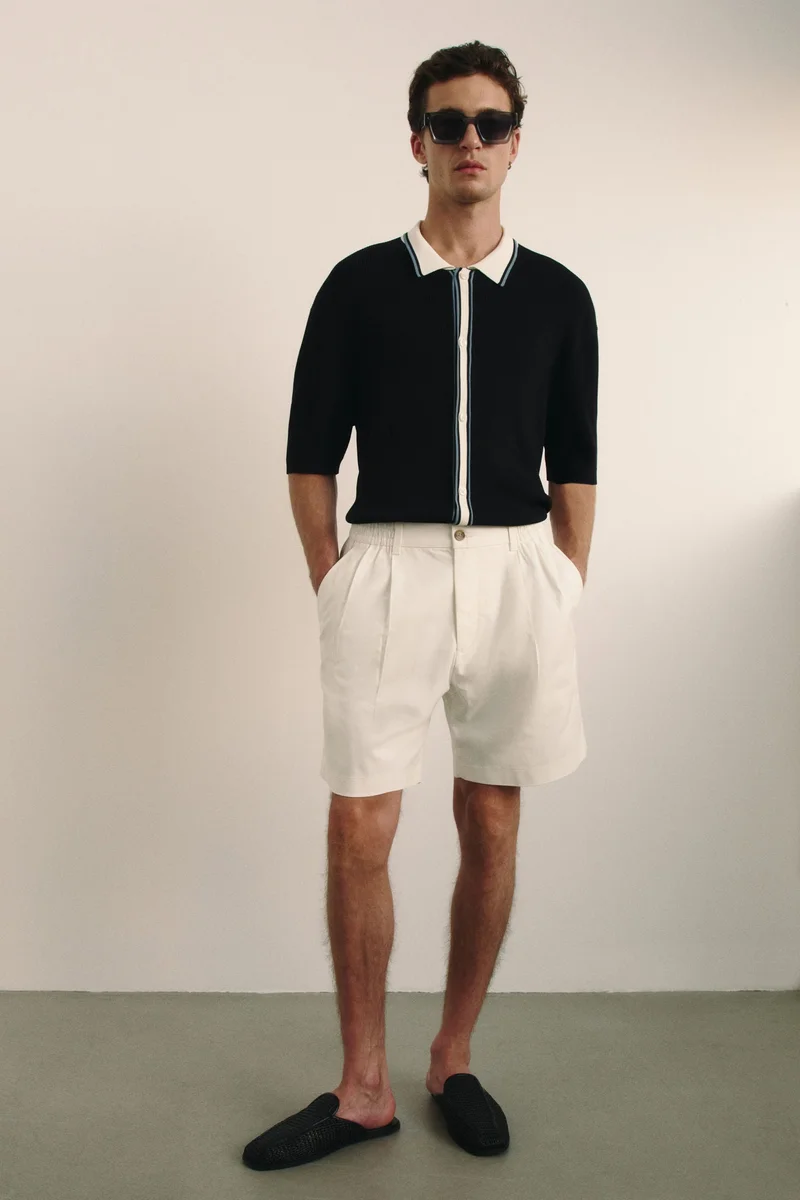 اتش اند ام Mid-length sports shorts with DryMove™