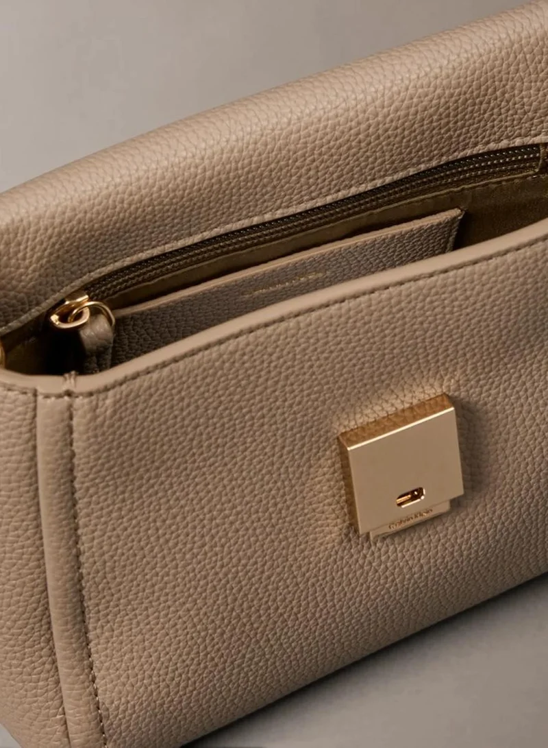 Calvin Klein Desert Taupe Pebble Grain Crossbody Bag for Women | Best Price UAE