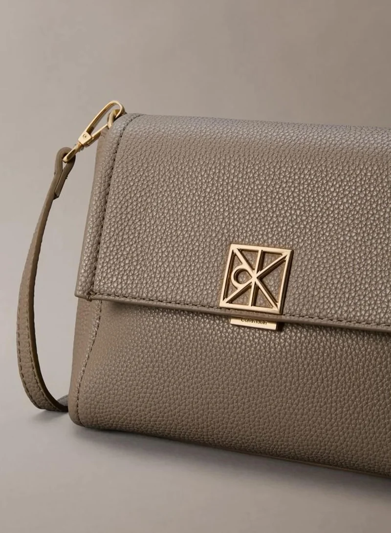 Calvin Klein Desert Taupe Pebble Grain Crossbody Bag for Women | Best Price UAE