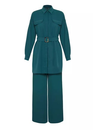 Elegant emerald green two-piece set in soft size 37, lightweight aerobic fabric, Designed with a collared shirt and wide-legged pants, it gives you a comfortable and modern look, Ideal for everyday wear and casual outings , It combines elegance and practicality with a breathable material that fits all body types Model TCTSS24US00061 - pzsku/ZB2859AC2CAA8D26C6601Z/45/1751371349/3640e2ea-6963-4339-8019-b035ab3a99f2