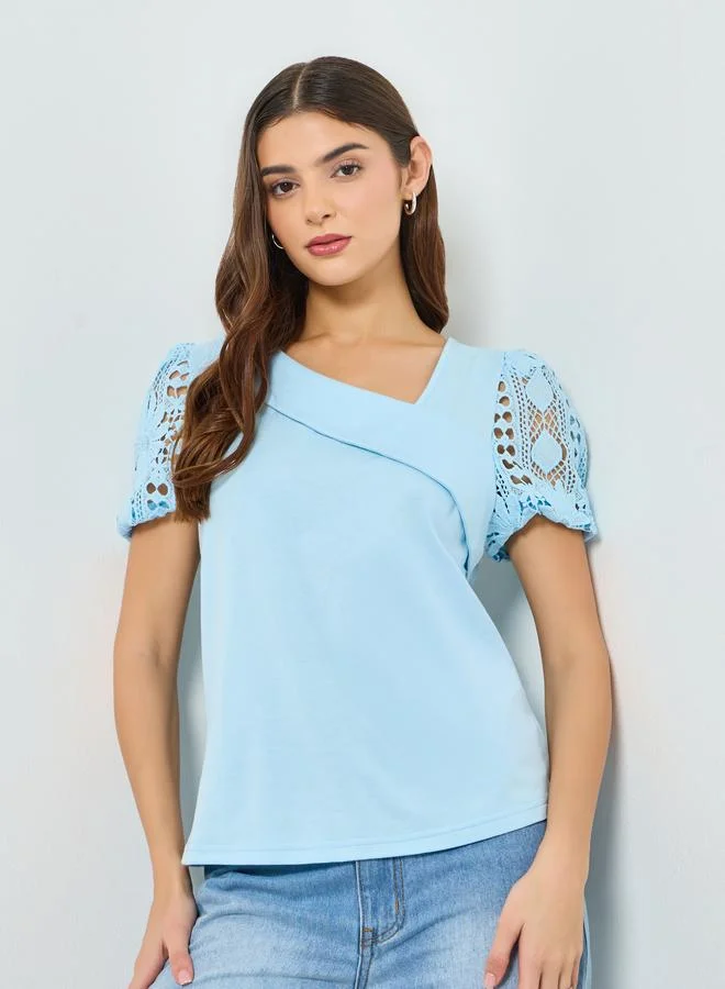 Take Two Blue Solid Asymmetric Neck Hollow Puff Sleeve Top
